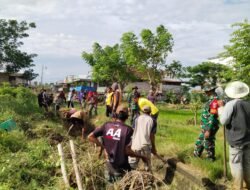 Koramil 1406-02/Tanasitolo Laksanakan Karya Bhakti Pembersihan Talut Bersama Masyarakat