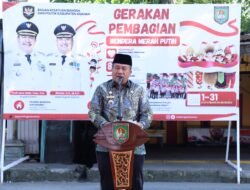 Bupati Asahan Pimpin Gerakan Pembagian Bendera Merah Putih
